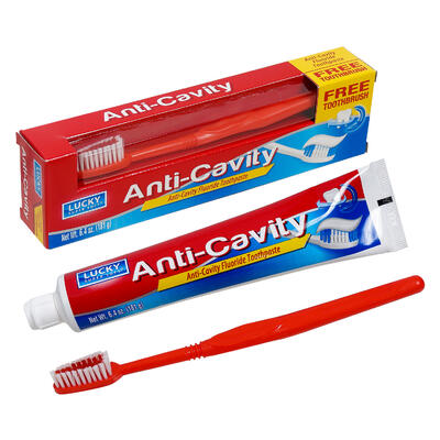 anti- cavity toothpaste w red brush- 6.4oz -- 24 per case